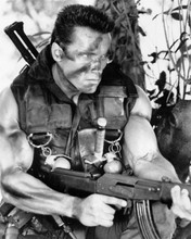 Arnold Schwarzenegger machine gun at the ready John Matrix Commando 8x10 photo