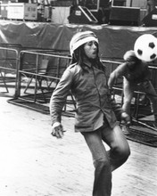 Bob Marley does some footbal between concert set-up 8x10 inch photo