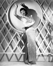 Anna May Wong strikes a dancer's pose in silk dress 8x10 inch photo