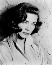 Lauren Bacall 1940's era portrait with seductive look against wall 8x10 photo