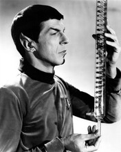 Leonard Nimoy holds tubular device as Mr Spock Star Trek classic TV 8x10 photo