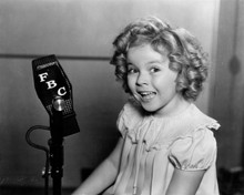 Shirley Temple stands in front of FBC microphone radio broadcast 8x10 inch photo