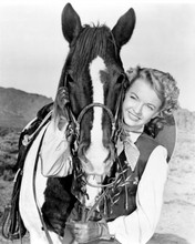 Dale Evans smiling pose with her Quarter Horse Buttermilk 8x10 inch photo