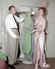 Maureen O'Hara in sheer gown looks at wardrobe dresses 8x10 inch photo