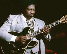 B.B. King legendary blues artist playing guitar on stage 8x10 inch photo