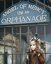 Barbra Streisand looks through gates at orphanage movie unknown 8x10 inch photo