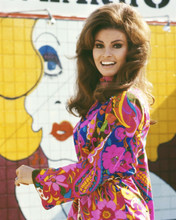 Raquel Welch in her 1960's prime smiling in colorful mini dress 8x10 inch photo