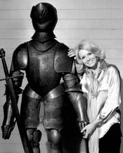 Angie Dickinson poses with suit of armor for Police Woman 1977 8x10 inch photo