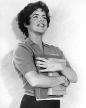 Stockard Channing smiling holding school books as Rizzo from Grease 8x10 photo