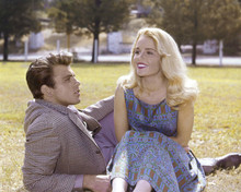 Tuesday Weld sits in park with unidentified man 1960's 8x10 inch photo