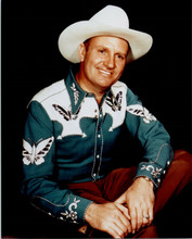 Gene Autry The Singing Cowboy great pose seated smiling 8x10 inch photo