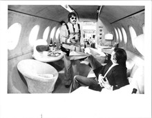 Moonraker 8x10 photo Roger Moore on plane kicks out at gunman