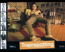 Trainspotting 8x10 inch photo Ewan Mcgregor sits by booze bottles 8x10 photo