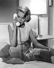 Sandra Dee sitting on bed holding telephone 1959 A Summer Place 8x10 inch photo