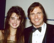 Brooke Shields circa 1980's smiles for press with unidentified man 8x10 photo