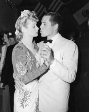 Lucille Ball 1950's dances with Desi Arnaz as he puckers for kiss 8x10 photo