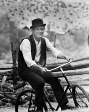 Paul Newman smiling as he rides bicycle butch Cassidy & Sundance Kid 8x10 photo