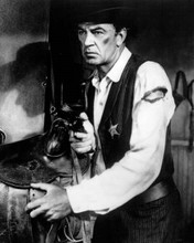 Gary Cooper as Will Kane in bullet torn shirt holding gun High Noon 8x10 photo