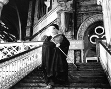 The Elephant Man 1980 John Hurt as John Merrick walks down steps 8x10 inch photo