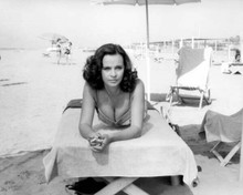 Laura Antonelli 1970's in bikini lying on beach chair 8x10 inch photo
