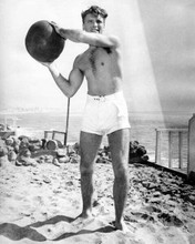Burt Lancaster beefcake 1950's on beach holding ball 8x10 inch photo