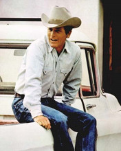 Paul Newman in jeans & cowboy hat sitting on pick-up truck 1970's 8x10 photo