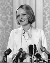 Jessica Lange smiling in white jacket 1970's at press conference 8x10 inch photo