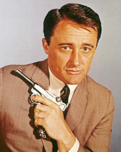 Robert Vaughn as The Man From UNCLE with gun across his chest 8x10 inch photo