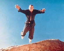 Kung Fu 1972 David Carradine as Caine leaping in air from mountain 8x10 photo