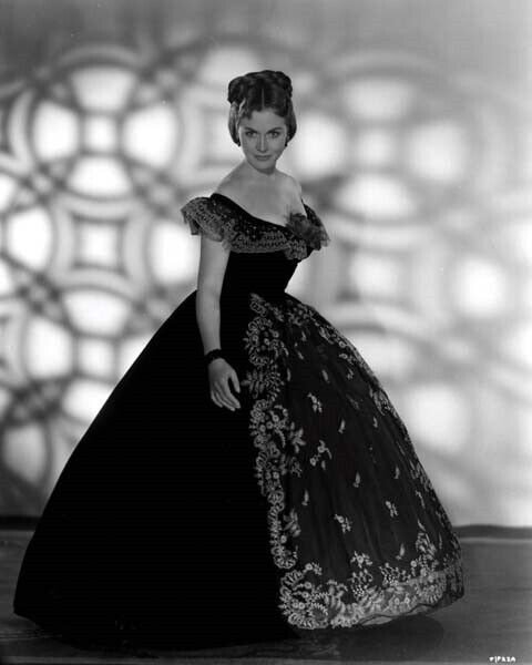 Beautiful woman model dressed in an elegant dress in a fashion pose Stock  Photo by ©matusciac 21453087