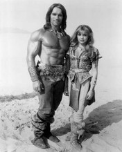 Conan The Destroyer Arnold Schwarzenegger Olivia D'Abo stand together 8x10 photo