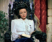 Gene Tierney sitting in chair reading book 1943 Heaven Can Wait 8x10 photo