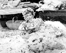 Maureen O'Hara covered in feathers in scene from 1963 McLintock 8x10 inch photo