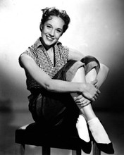 Julie Andrews 1960's sitting on still in checkered shirt and jeans 8x10 photo