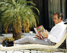 Sean Connery relaxes on Diamonds Are Forever set reading magazine 8x10 photo