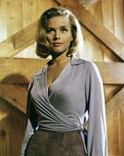 Honor Blackman 8x10 inch photo ready for action as Pussy Galore in Goldfinger