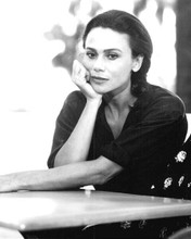 Lena Olin seated at table in black dress 1990 Havana 8x10 inch photo