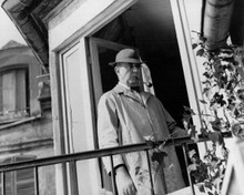 Jacques Tati as Monsier Hulot in his raincoat and hat 8x10 inch photo