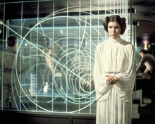 Carrie Fisher as Princess Leia standing by star chart Star Wars 8x10 inch photo