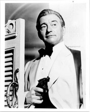 Claude Rains debonair and charming in white tuxedo holding gun 8x10 inch photo