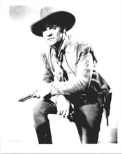 James Cagney 1939 The Oklahoma Kid in frontier jacket holding guns 8x10 photo