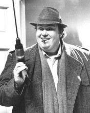 John Candy holds up electric drill smiling as Uncle Buck 8x10 inch photo