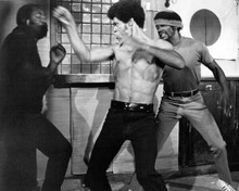 Fists of Fury 1972 Bruce Lee takes on two assailants 8x10 inch photo