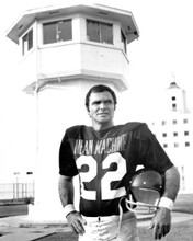 Burt Reynolds in football jersey holds helmet 1974 The Longest Yard 8x10 photo