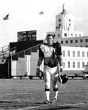 Burt Reynolds strides across fottball field 1974 The Longest Yard 8x10 photo