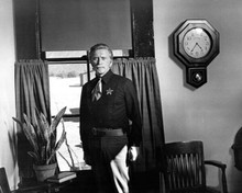 Posse 1975 Sheriff Kirk Douglas stands next to clock 8x10 inch photo