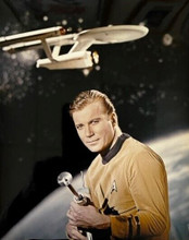 William Shatner poses with space gun Enterprise behind him Star Trek 8x10 photo
