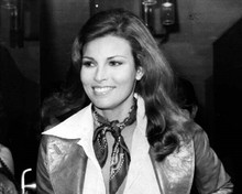 Raquel Welch 1970's smiles for cameras in leather jacket 8x10 inch photo