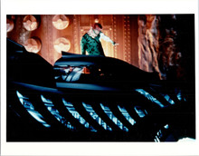 Batman Forever Jim Carrey as Riddler looks at Batmobile 8x10 inch photo