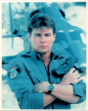 Jan-Michael Vincent poses with gun next to helicopter Airwolf 8x10 inch photo